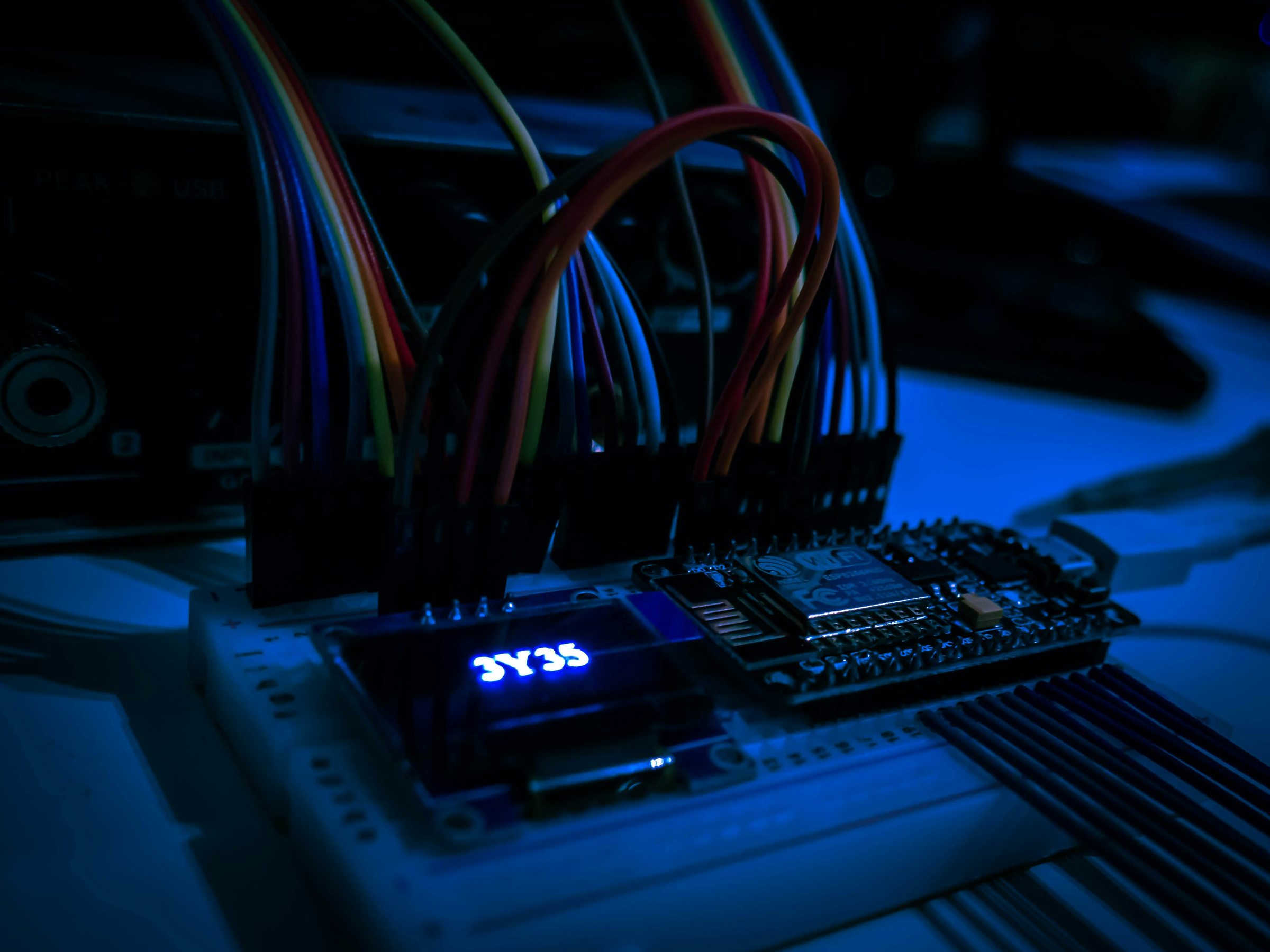 Electronic circuit board and wires on a workbench